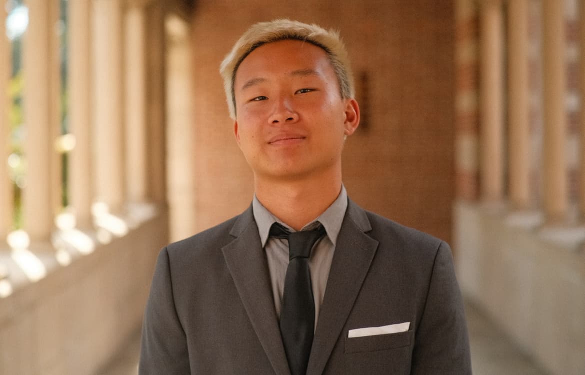 Portrait of Noah Neri in a suit